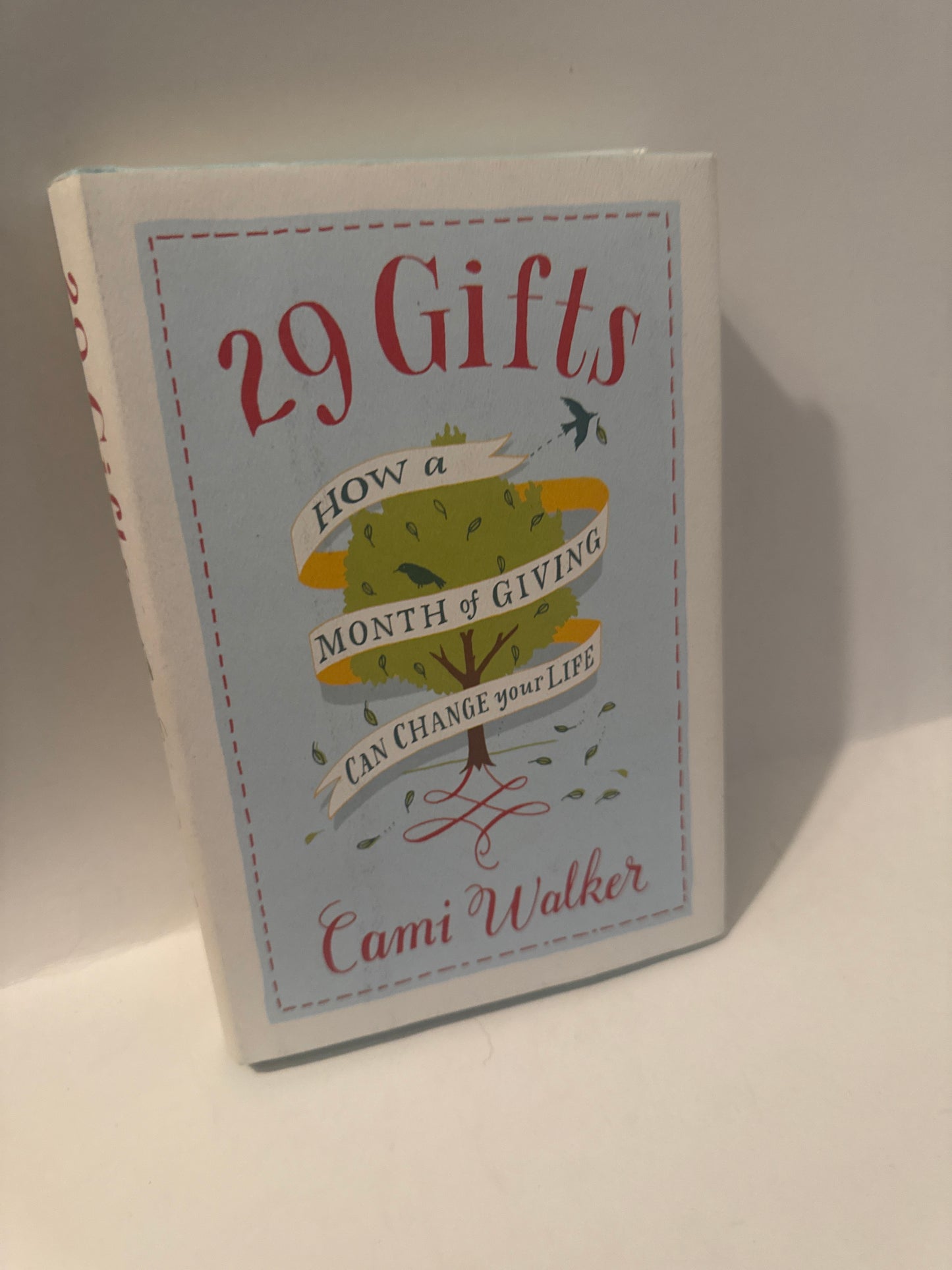 29 Gifts by Cami Walker book cover – tree with red ribbon – guide to emotional healing, generosity, and spiritual growth through daily acts of giving