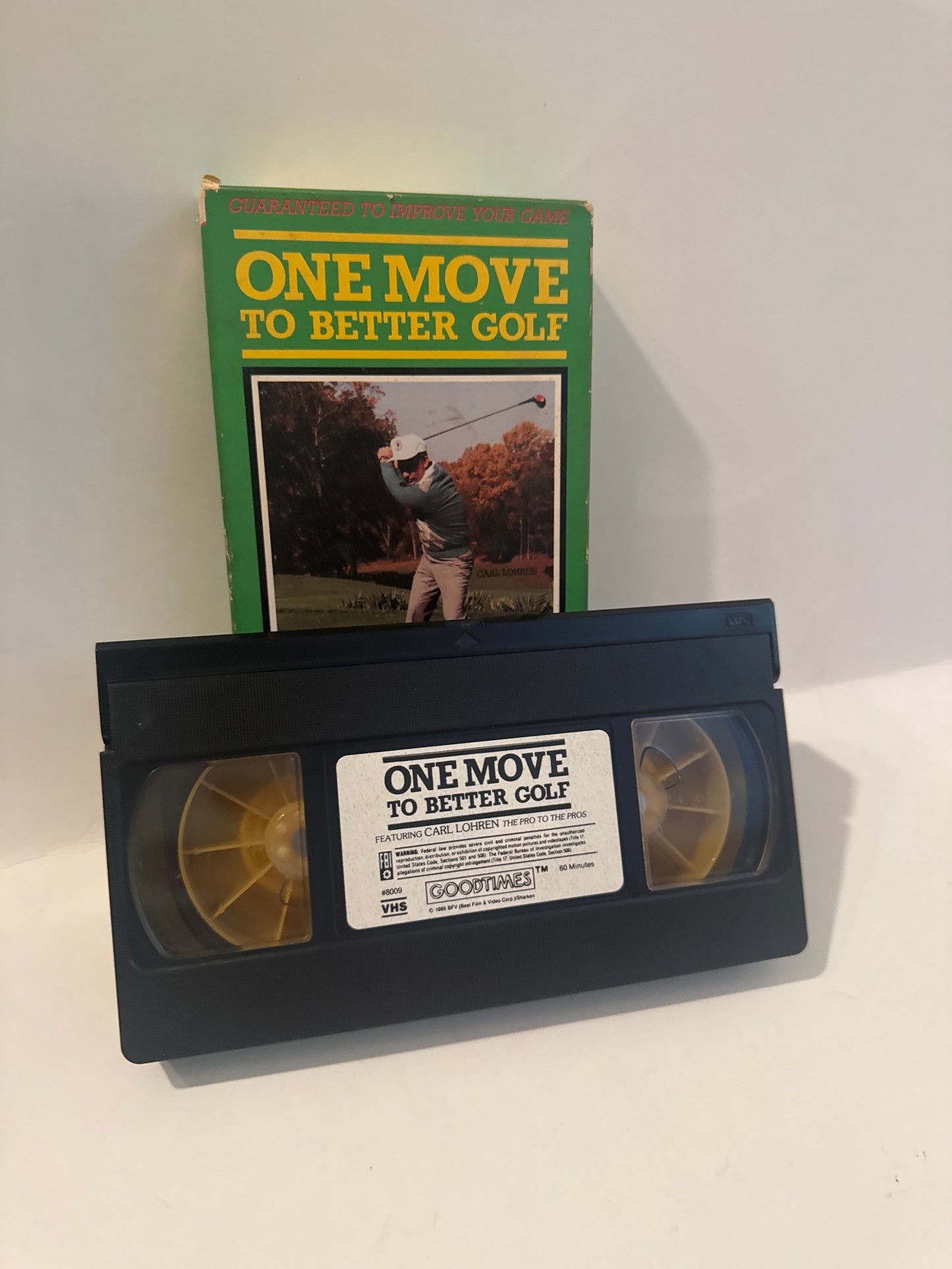One Move to Better Golf VHS tape with green instructional sleeve showing golfer swinging