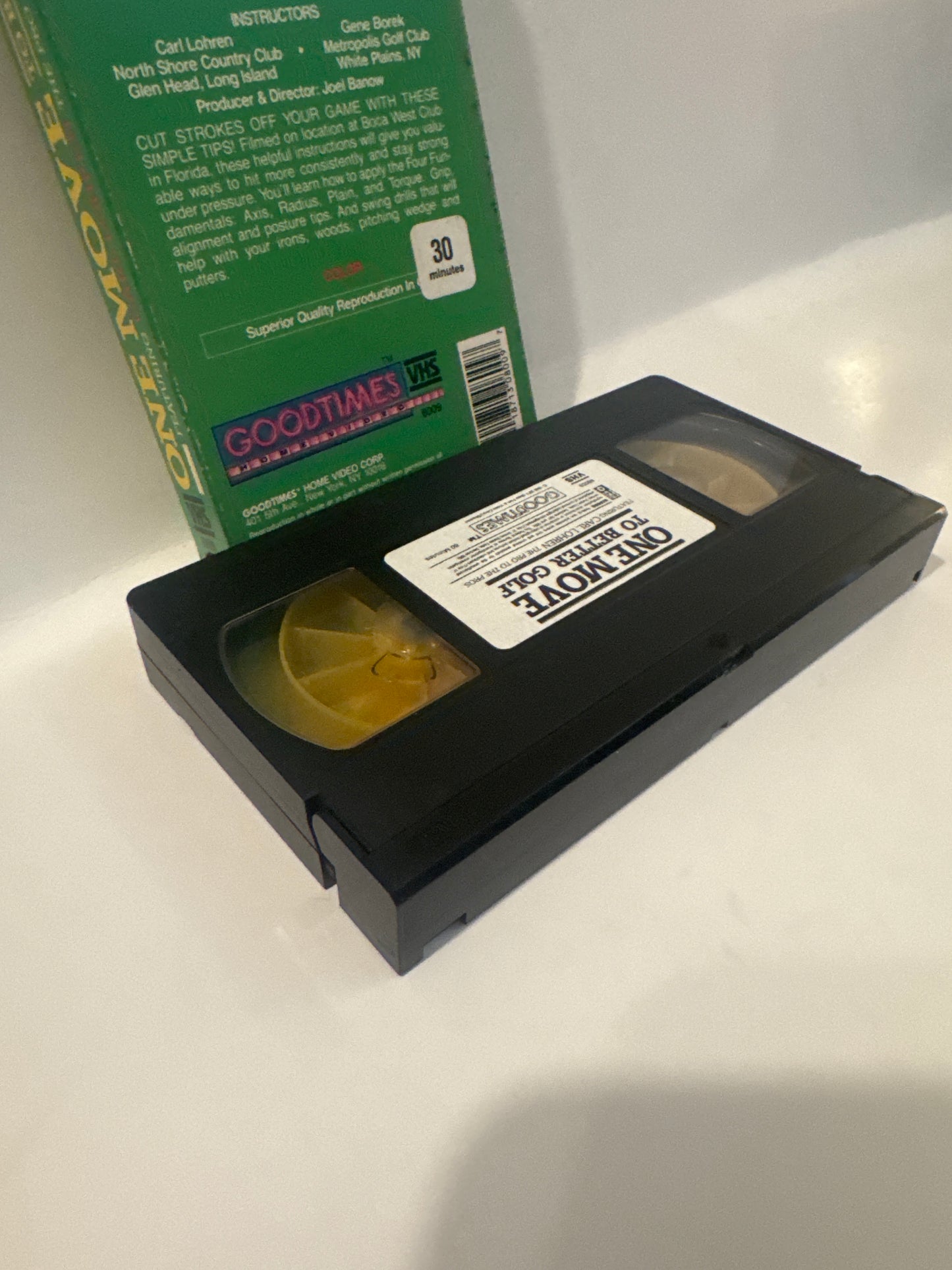One Move to Better Golf VHS tape with original green cardboard sleeve showing label and clear reels