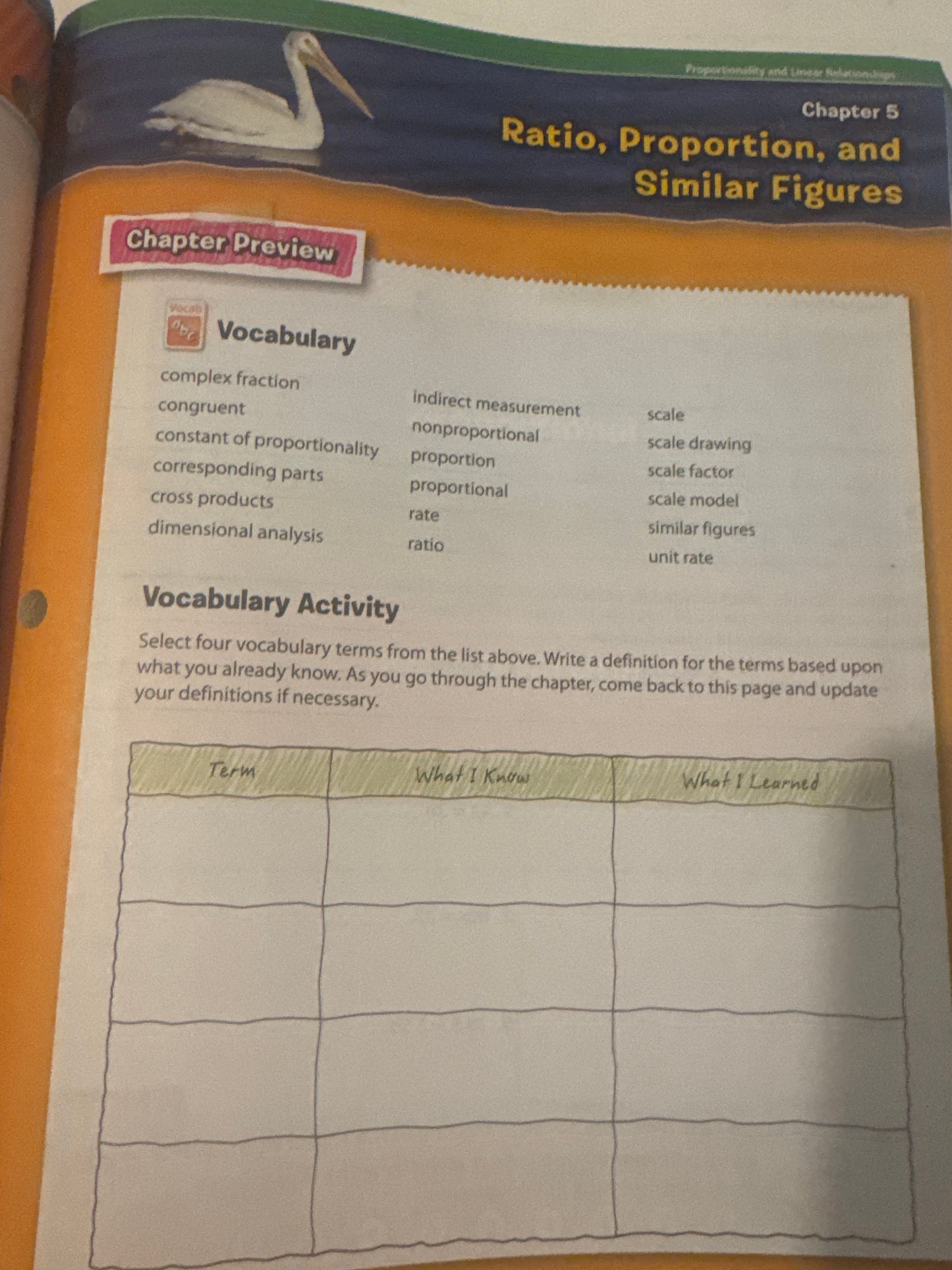 Textbook page with chapter title 'Ratio, Proportion, and Similar Figures' and a vocabulary activity section.