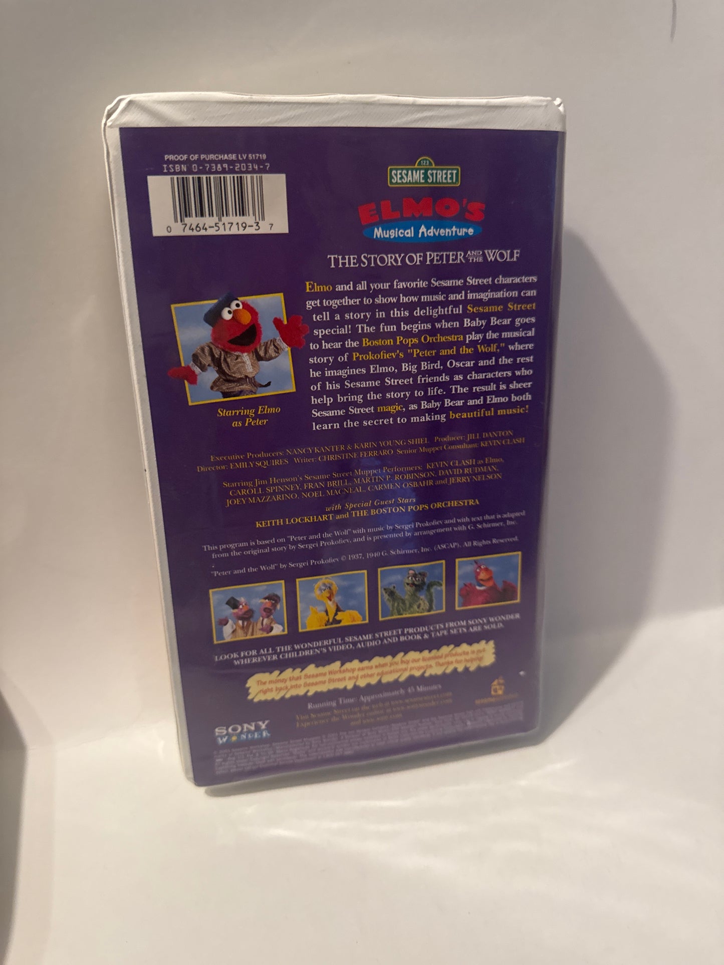 Elmo’s Musical Adventure VHS featuring characters from Sesame Street and the story of Peter and the Wolf