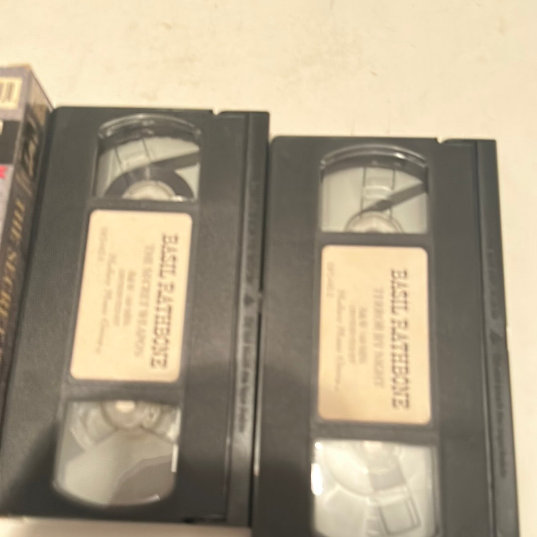 EveryMailBox Basil Rathbone VHS collection featuring classic black and white movie tapes