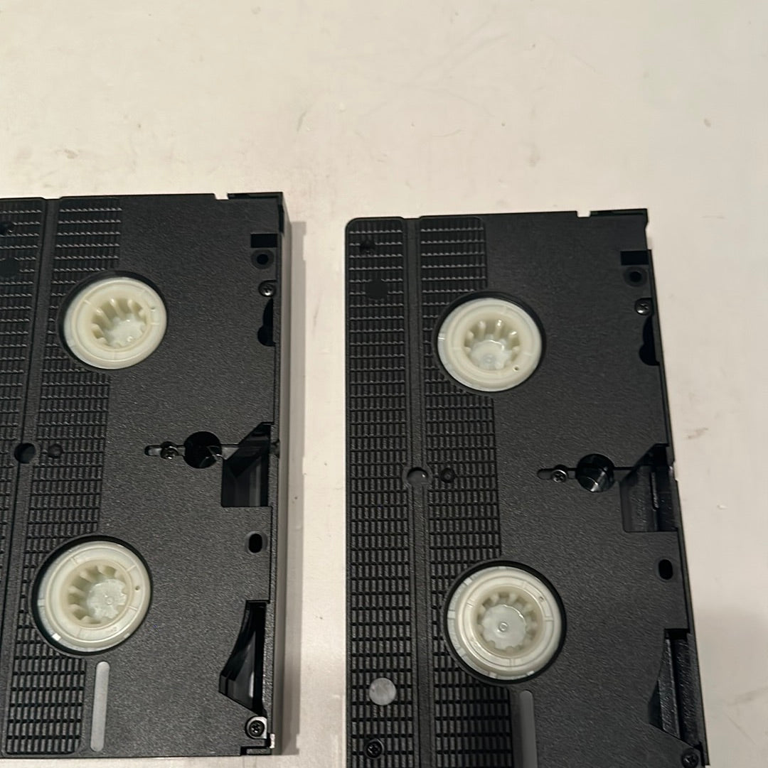 Two black VHS tapes from the Basil Rathbone VHS collection by EveryMailBox on white background