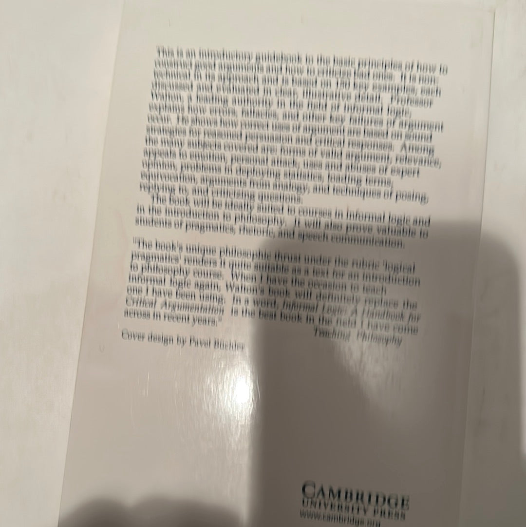 Back cover of the informal logic handbook by EveryMailBox with text description and publisher logo