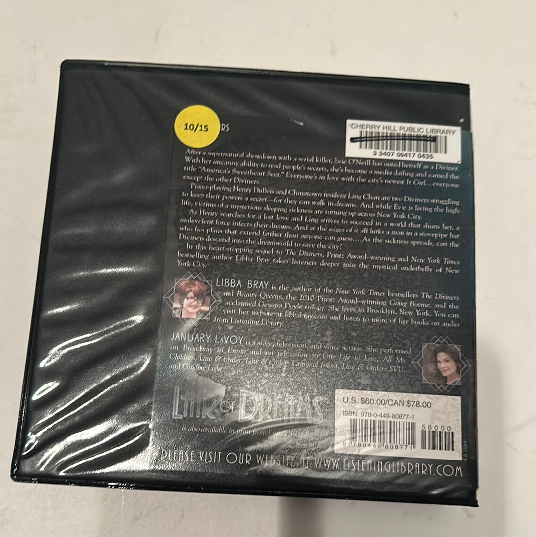 Back cover of Lair of Dreams audiobook by EveryMailBox with author bios and library barcode