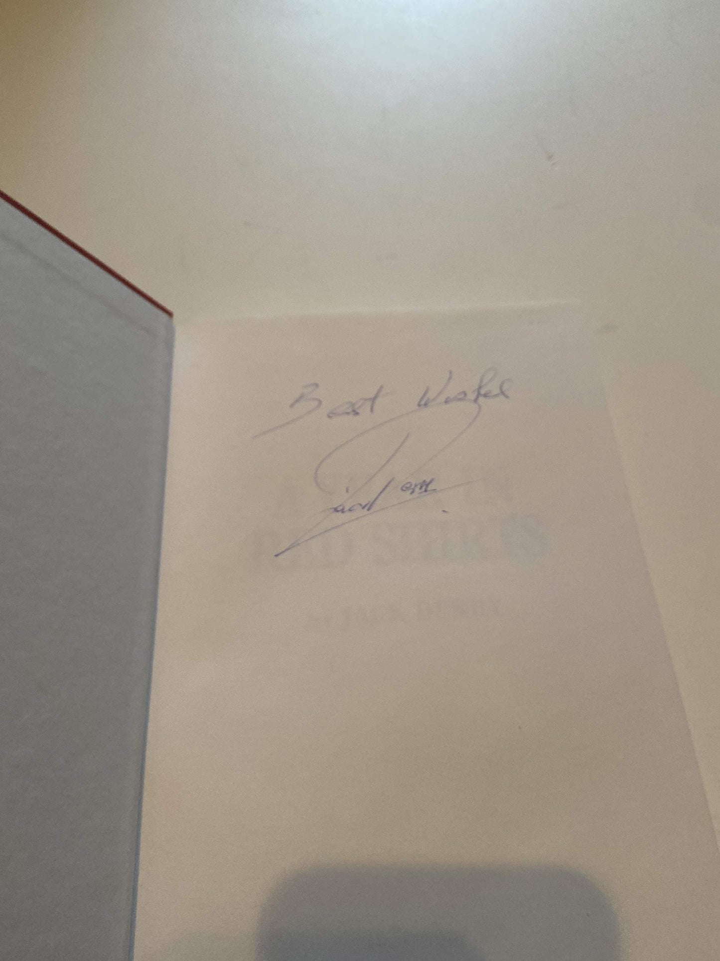 Signed page inside the Red Shirts historical novel with handwritten message and signature