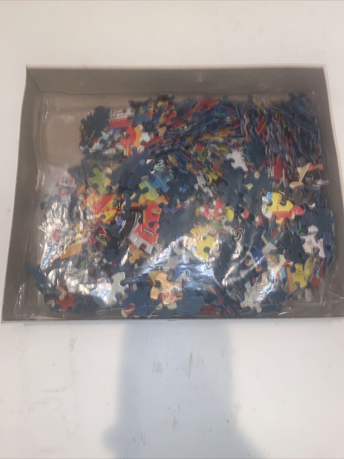White Mountain 1000 piece puzzle pieces inside a box ready for assembly