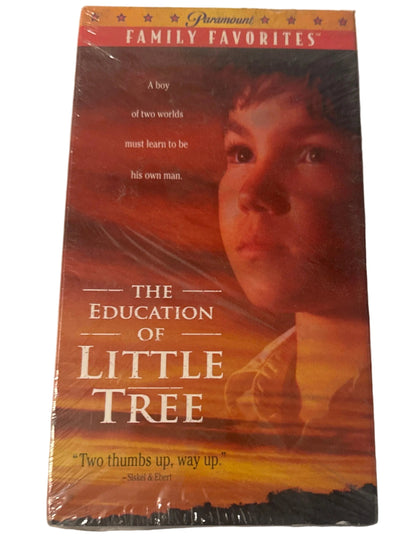 A sealed VHS tape of the movie 'The Education of Little Tree' with a 'Dawnstar Family Favorites' label, photographed on a white surface.