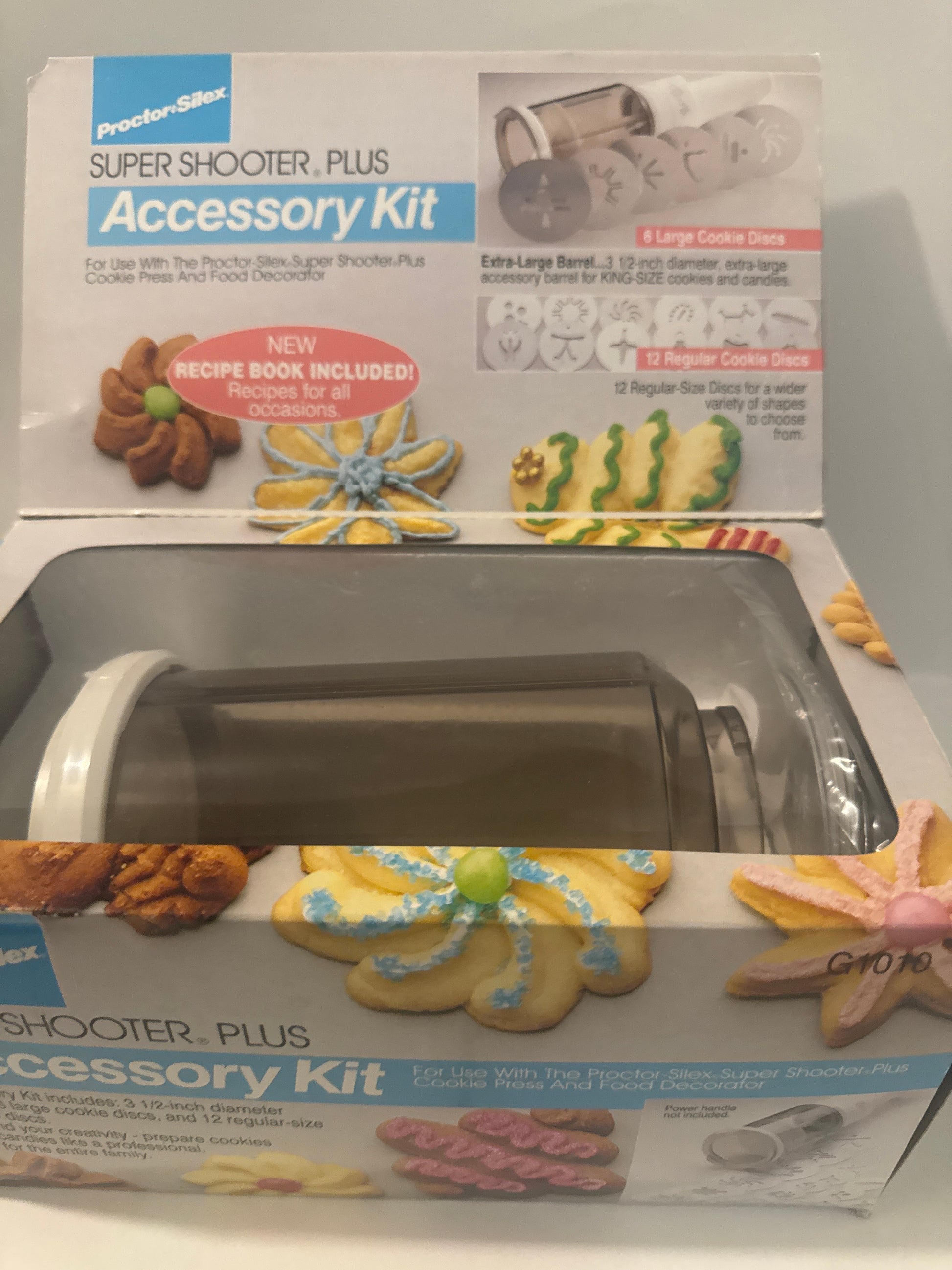 Proctor Silex G1010 Super Shooter Plus Cookie Kit with multiple decorating tips for festive baking.