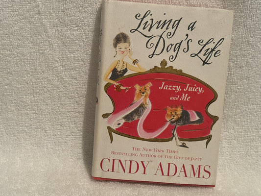 Living a Dog’s Life” by Cindy Adams