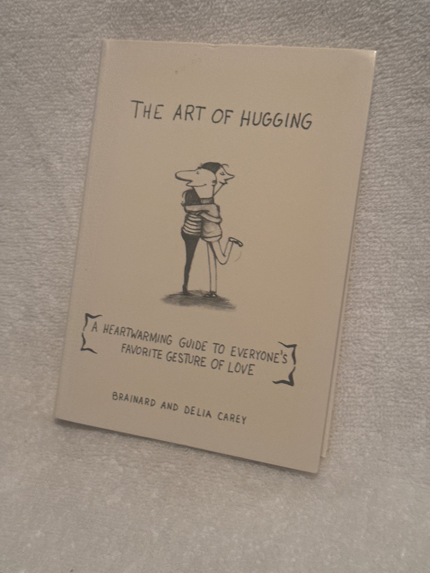 The Art of Hugging: A Heartwarming Guide by Brainard and Delia Carey