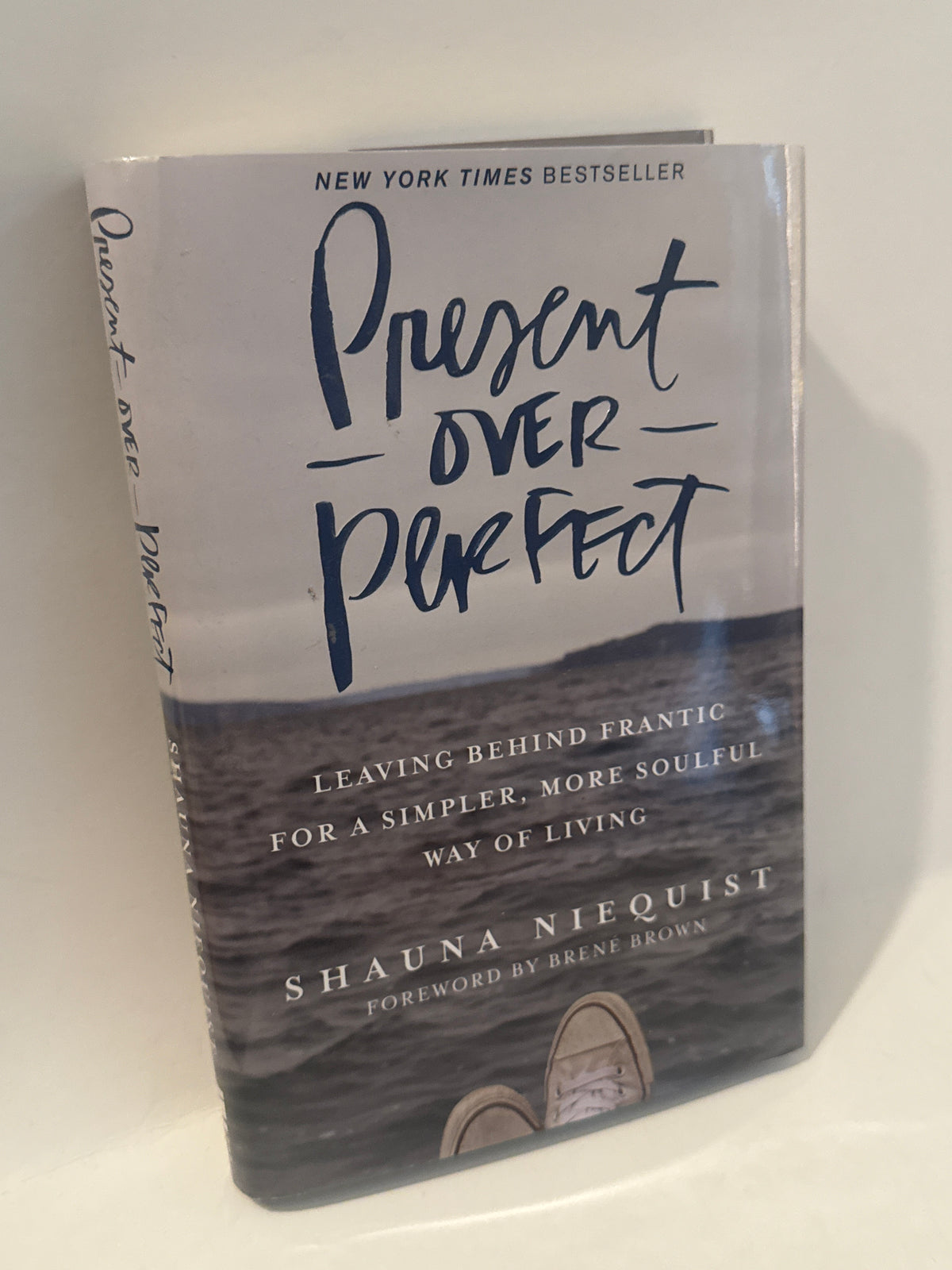Present Over Perfect book cover – Shauna Niequist – soulful living guide to simplicity, spiritual renewal, and emotional wellness – ocean scene