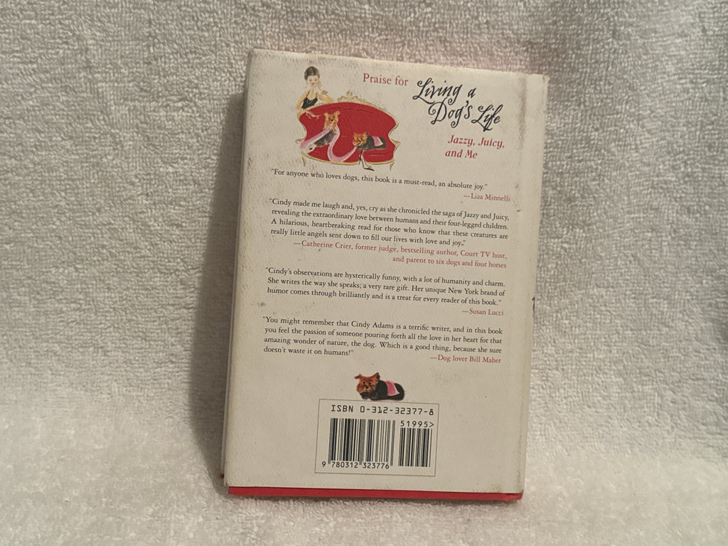 Living a Dog’s Life” by Cindy Adams