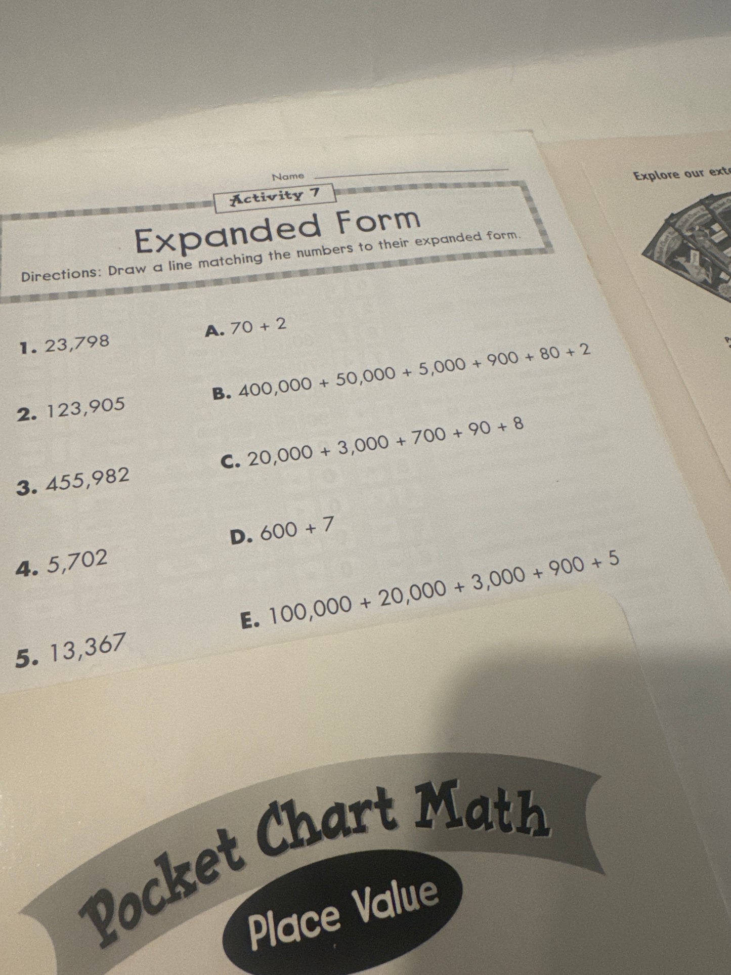Classroom-friendly math resource featuring pocket chart activities and number visuals