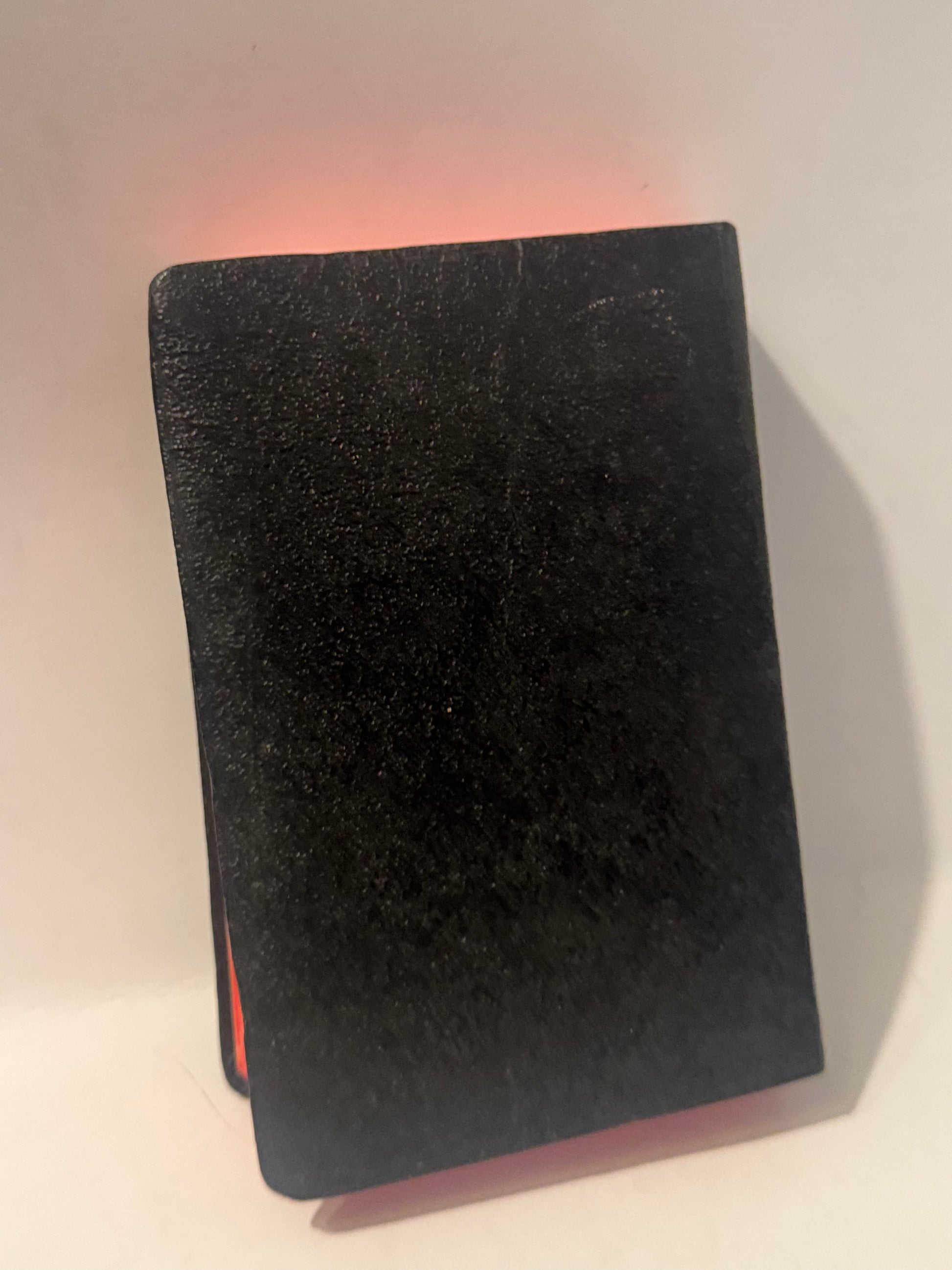  Catholic prayer book titled Maryknoll Missal with vertical white text