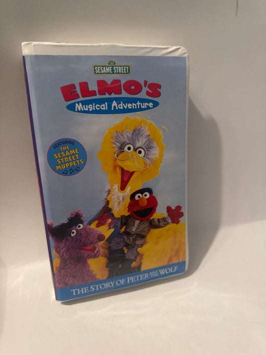 Elmo’s Musical Adventure VHS featuring Sesame Street characters and The Story of Peter and the Wolf