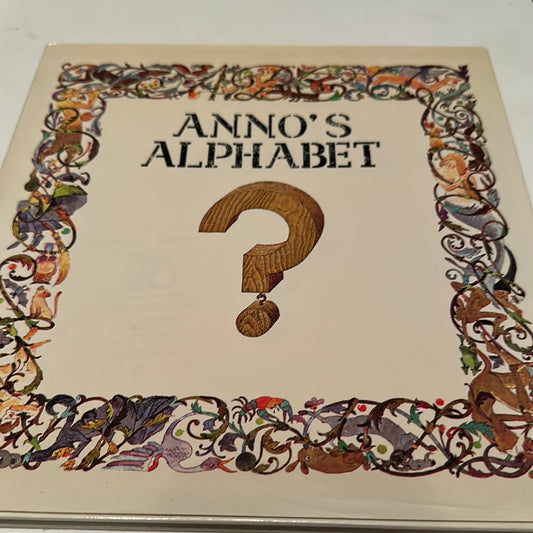 Anno's Alphabet book with decorative illustrated border and bold question mark on cover