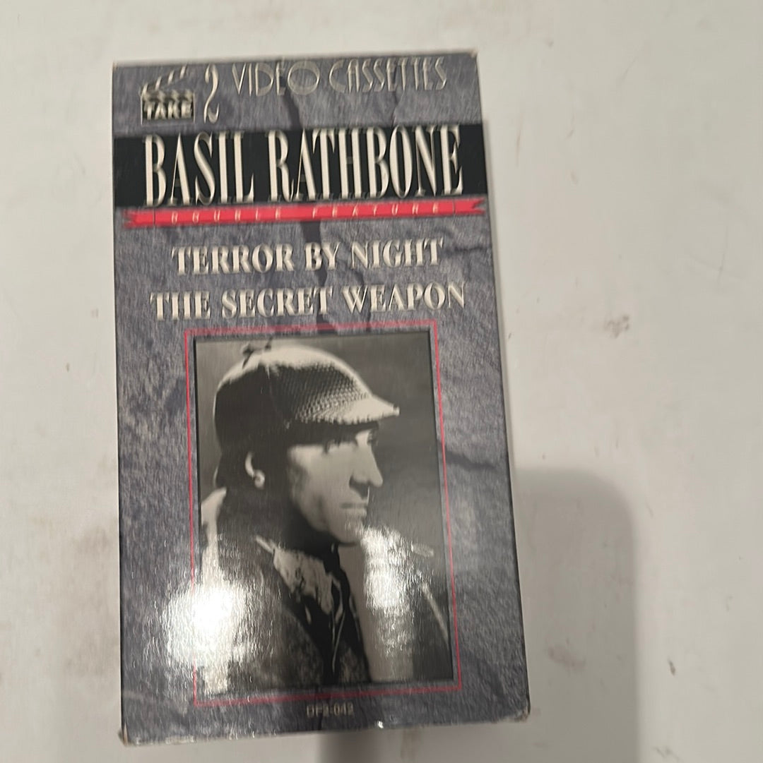 Basil Rathbone VHS collection featuring Terror by Night and The Secret Weapon in original video cassette packaging