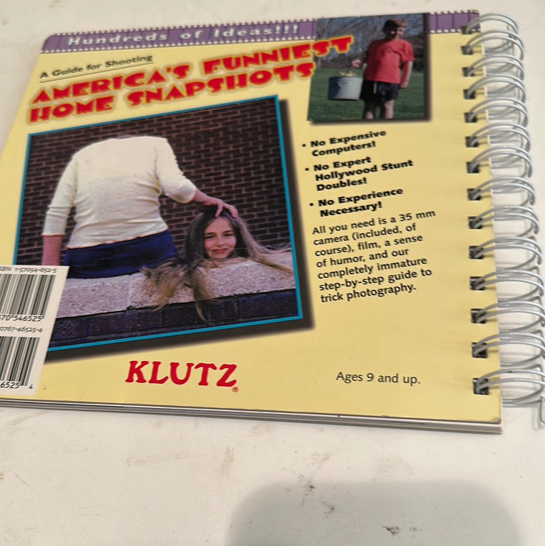 Tricky pix photo book titled Americas Funniest Home Snapshots with spiral binding and colorful cover
