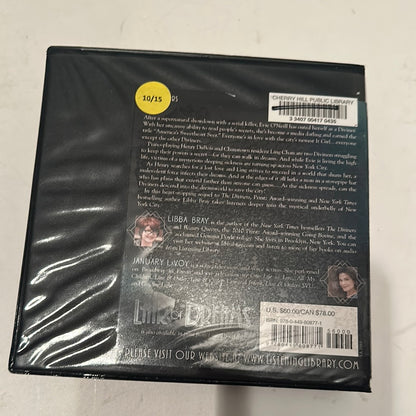 Back cover of Lair of Dreams audiobook by EveryMailBox with author bios and library barcode