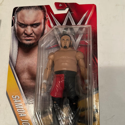 WWE Samoa Joe action figure in packaging with red and black wrestling outfit by EveryMailBox