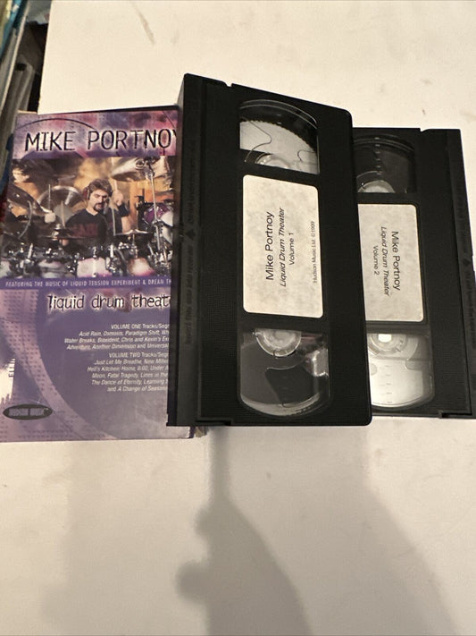 Mike Portnoy Liquid Drum Theater VHS two labeled VHS tapes with original cover showing Mike Portnoy at drum kit