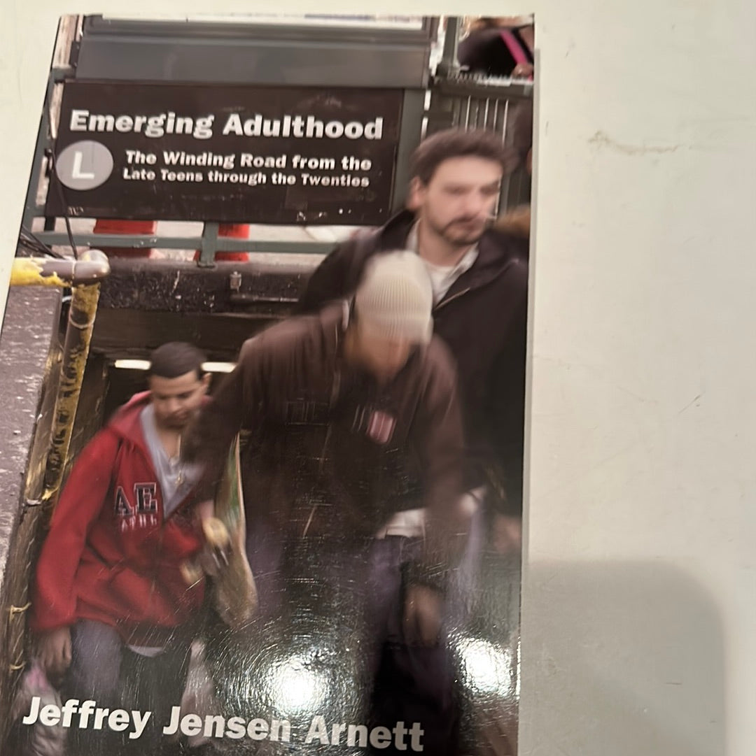 Transition from teens to twenties book Emerging Adulthood by Jeffrey Jensen Arnett showing young adults in subway