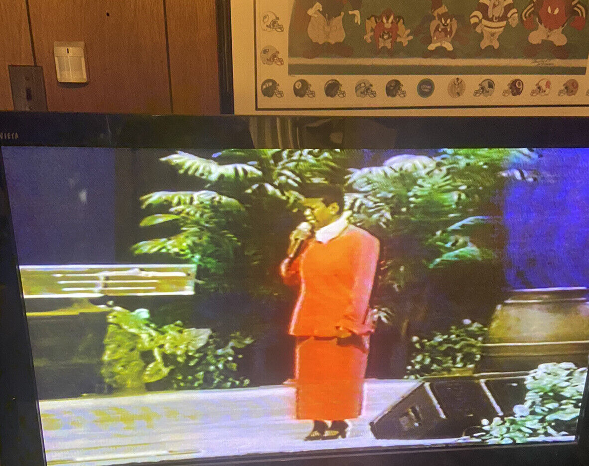 Panasonic OmniVision VHS player playing a vintage VHS recording of a woman singing on stage