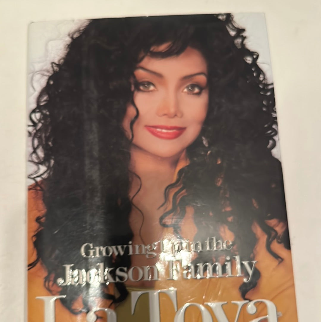 Rare La Toya Jackson book titled Growing Up in the Jackson Family with cover photo of La Toya Jackson