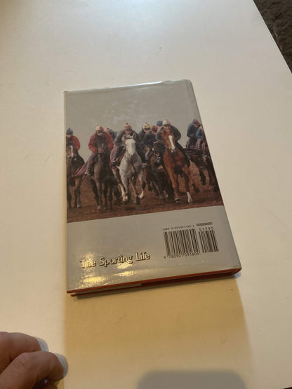 Back cover of Red Shirts historical novel showing horse racing scene with jockeys on horses