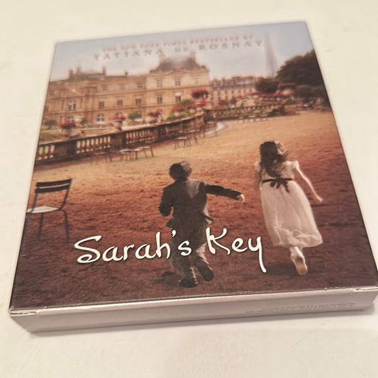 Sarah's Key book for sale showing cover with two children running in a historic courtyard