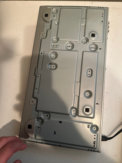 Metal casing of DVD CD player showing internal structure and screw holes buy used DVD CD player online