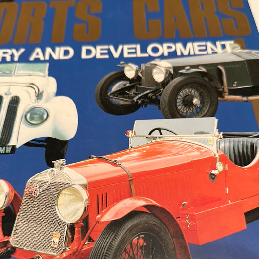 Cover of sports car collector guide featuring vintage red and black classic sports cars on blue background
