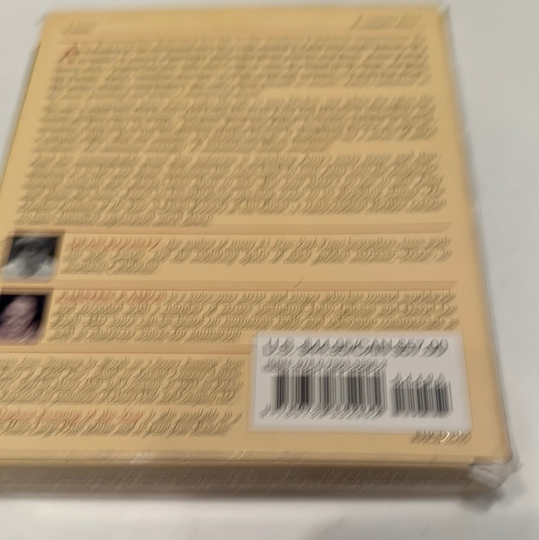 Blurry image of the back cover of The Darkest Evening of the Year book by EveryMailBox