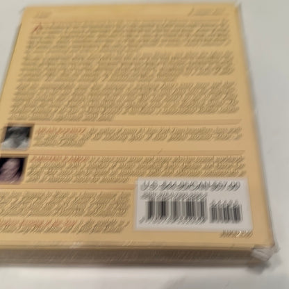 Blurry image of the back cover of The Darkest Evening of the Year book by EveryMailBox