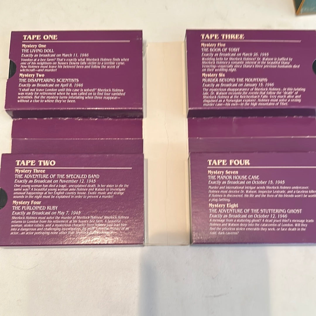 EveryMailBox mystery story tapes set with detailed titles and broadcast dates on purple cards
