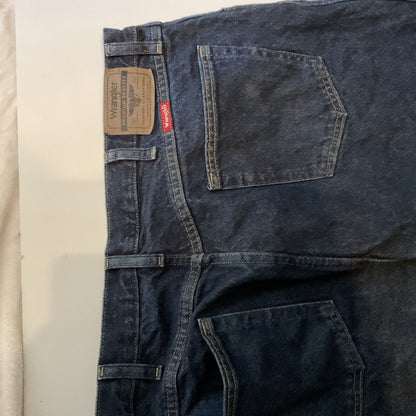 Wrangler relaxed fit jeans men dark blue denim back view showing waistband leather patch and back pockets