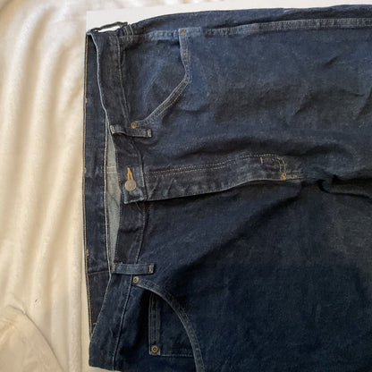 Wrangler relaxed fit jeans men dark indigo front view with button waist belt loops and front pockets